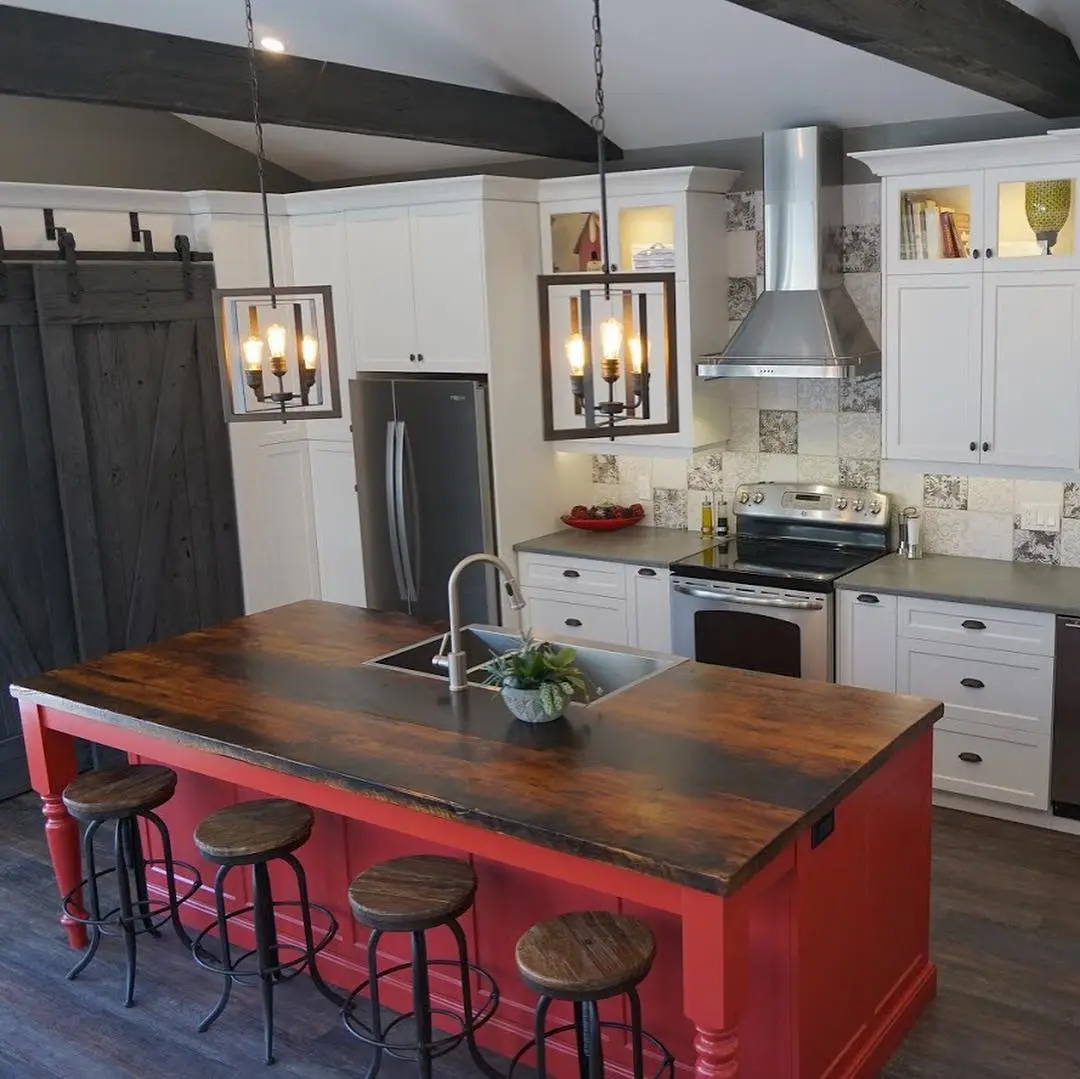 Reclaimed hemlock kitchen with island and perimeter cabinetry by Heirlooms Custom Cabinetry