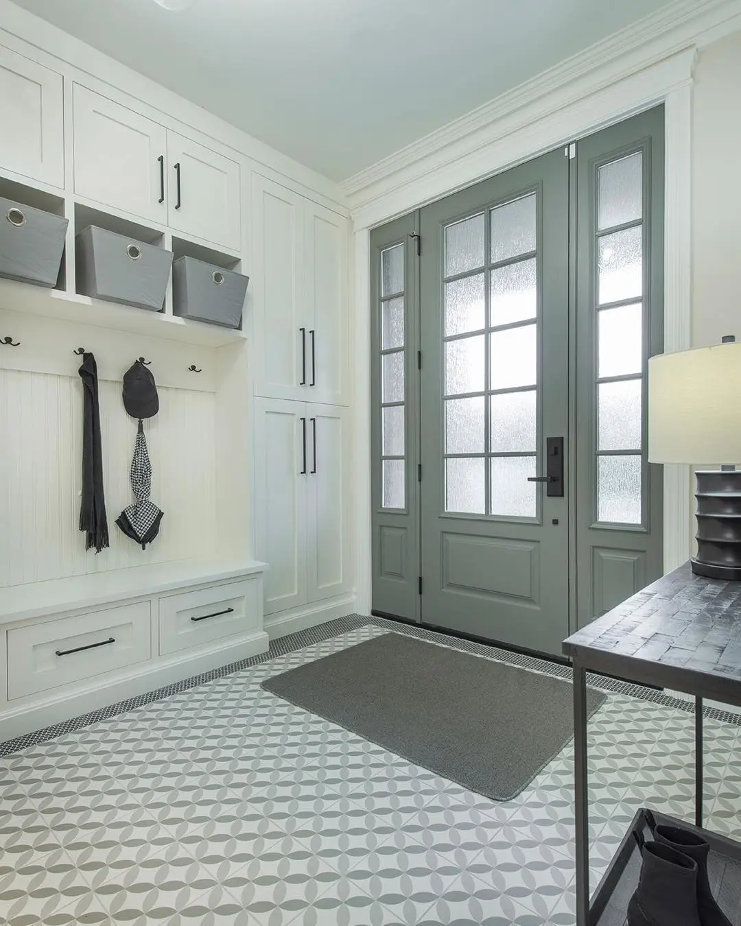 Inset mudroom cabinetry by Heirlooms Custom Cabinetry