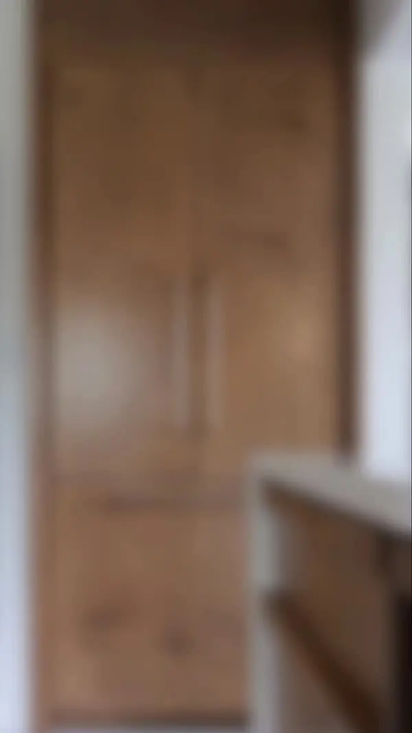 Kitchen with hidden appliance video by Heirlooms Custom Cabinetry