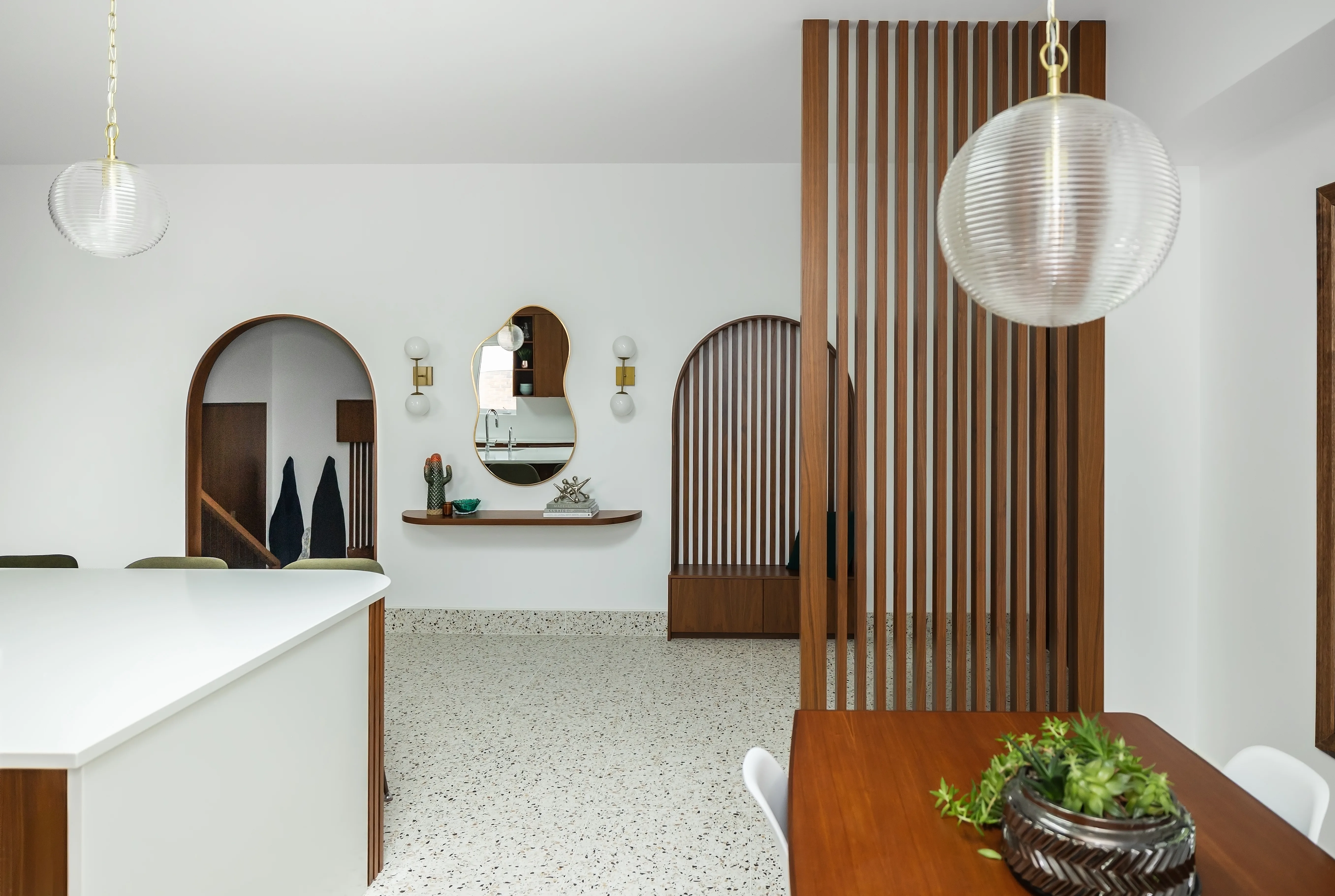 Modern walnut kitchen cabinetry by Heirlooms